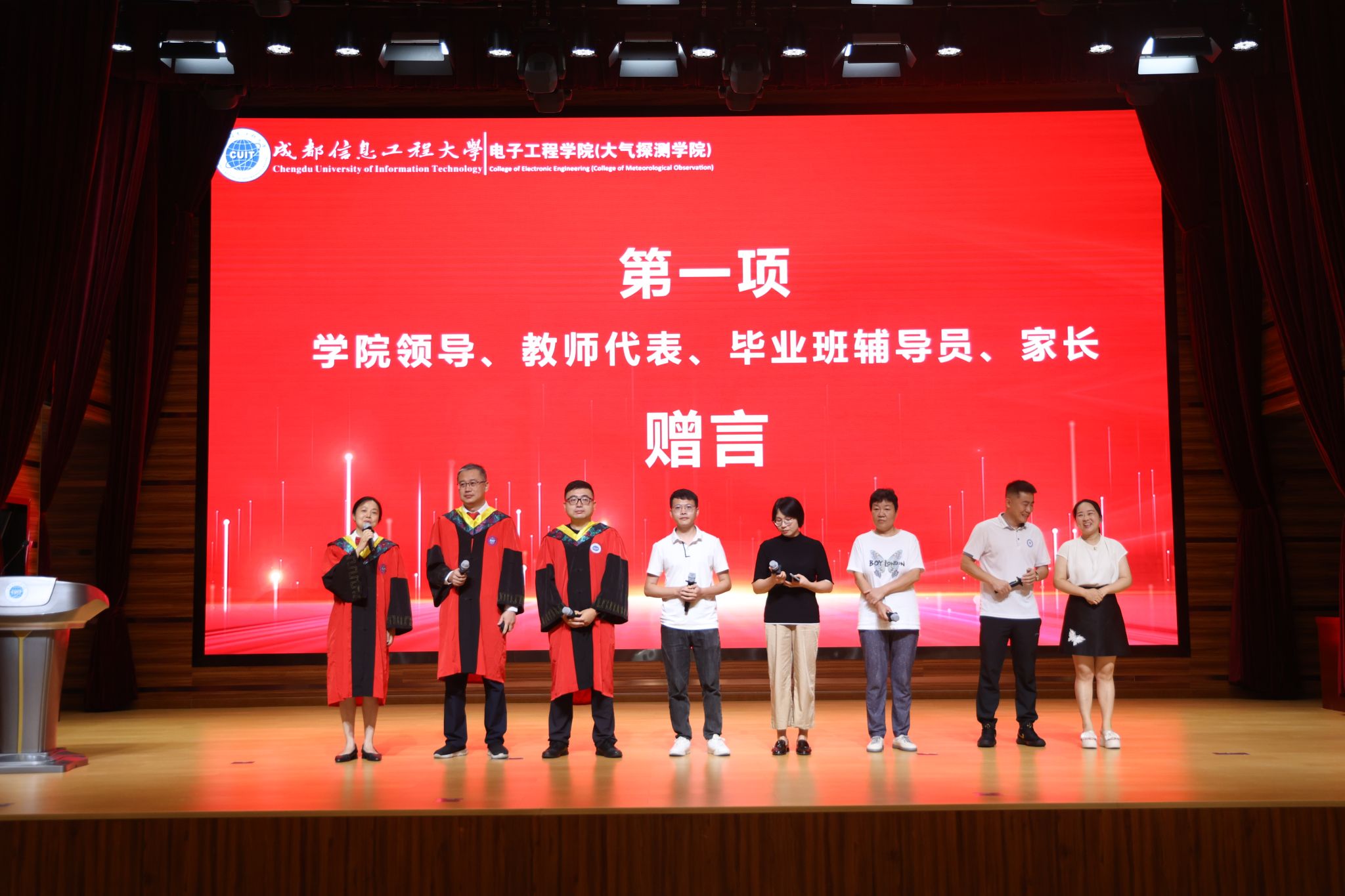 A group of people standing on a stage AI-generated content may be incorrect.